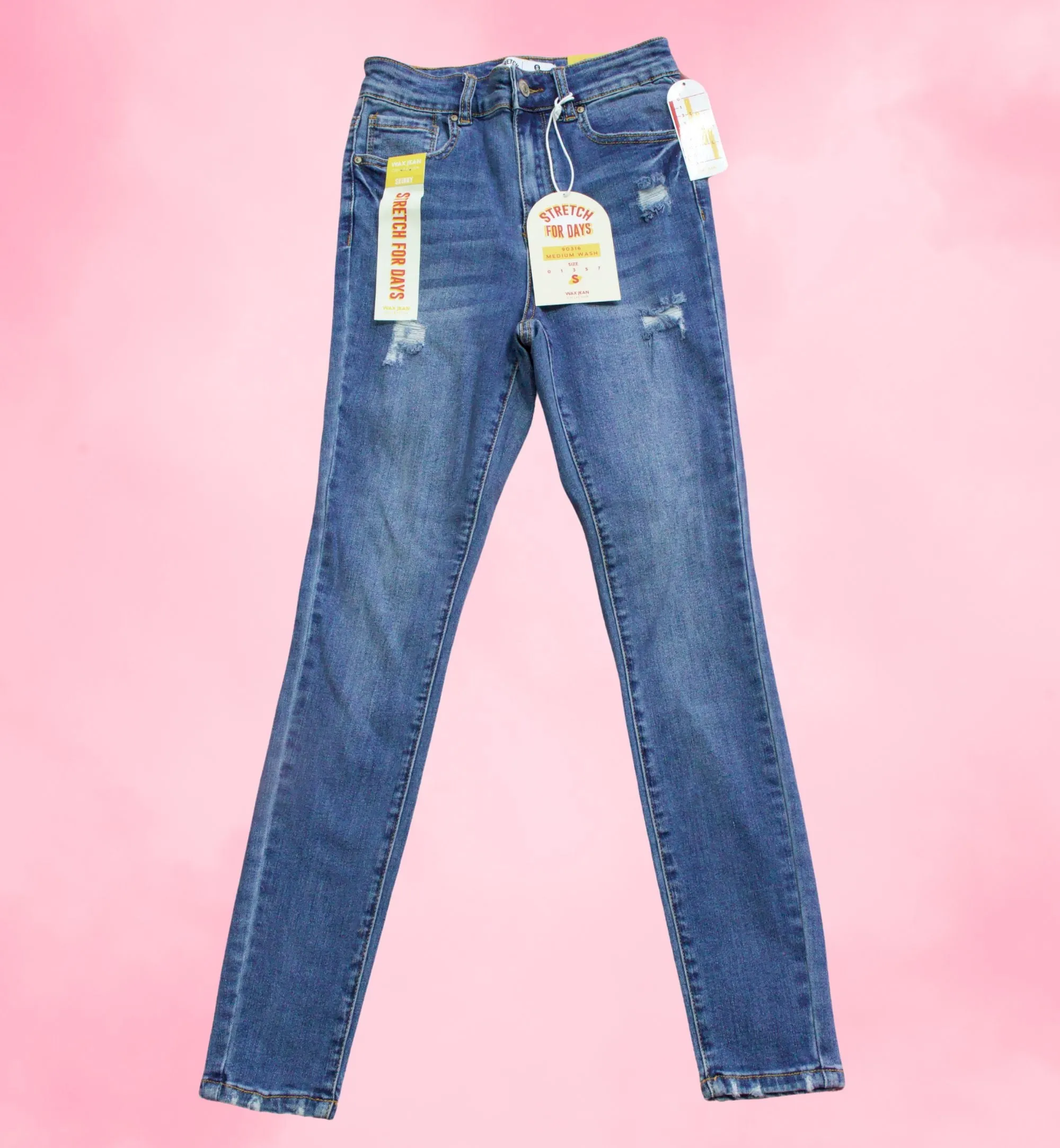 JEANS SKINNY CON DETALLES RASGADO 90316